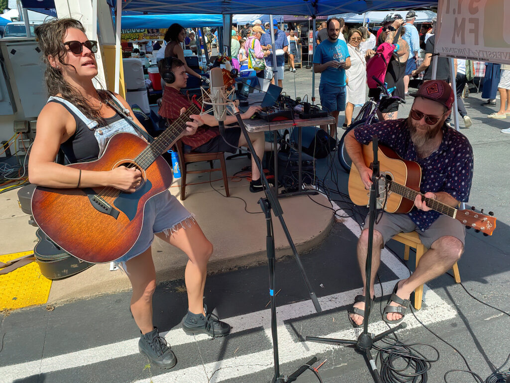 Musicians singing outdoors