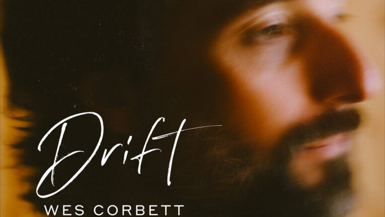 male head with text of album title and artist name