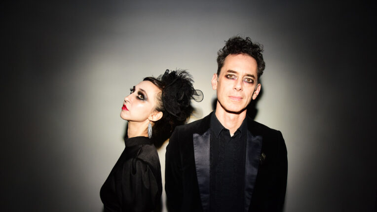 Woman with her back to a man