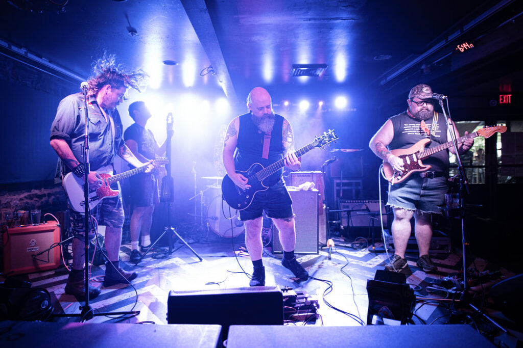 Musicians on lit stage