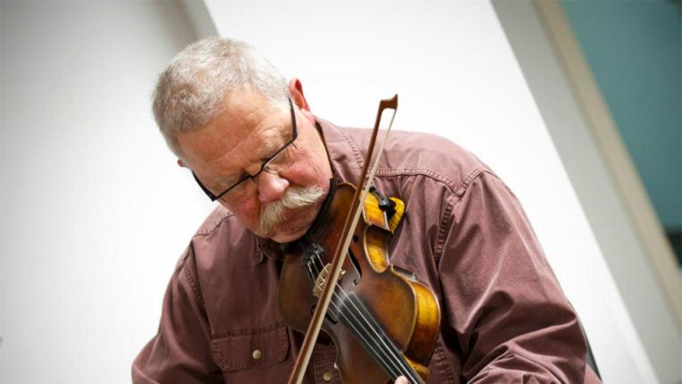 Man playing fiddle