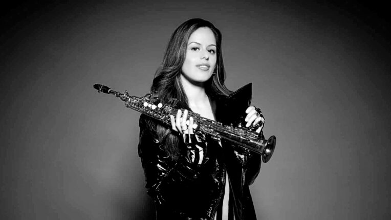 Alexa Tarantino holding her saxophone