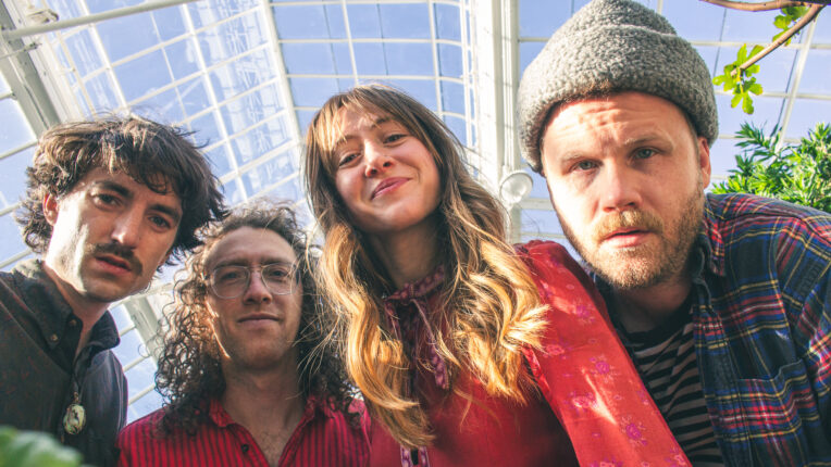 Closeup of four people from below