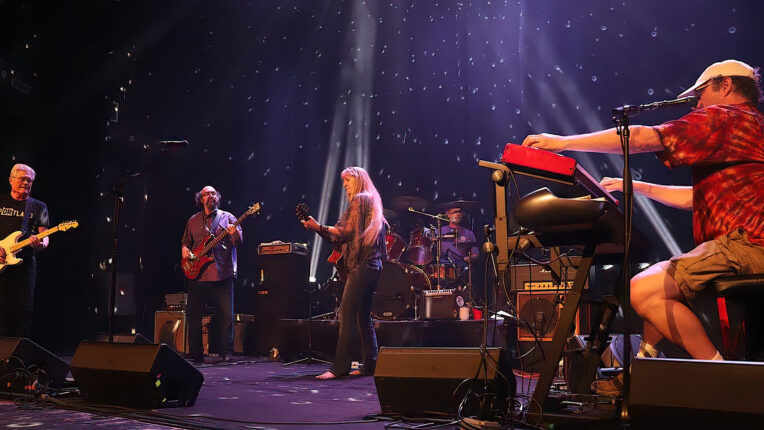 several musicians on a stage