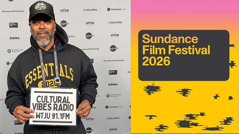 WTJU DJ Ty Cooper stands in front of a wall at the Sundance Film Festival with a sign that says 