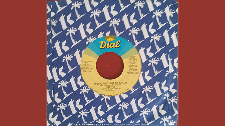 7 inch record from Dial label with palm trees on the sleeve.
