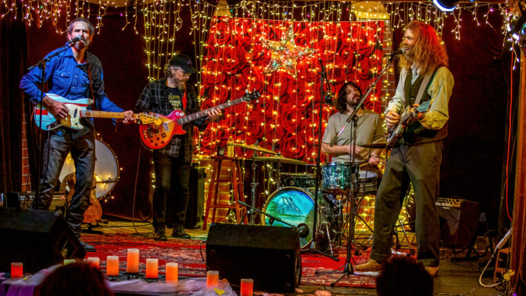 Musicians on colorful stage