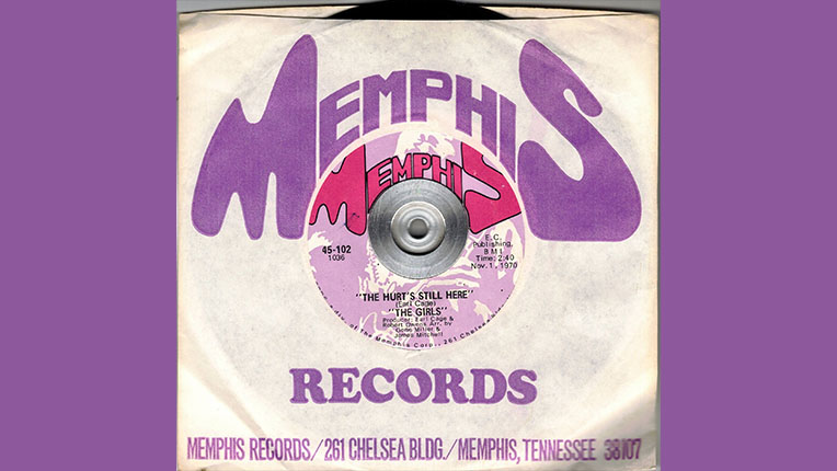 7 inch records in a Memphis Records cover with purple print.