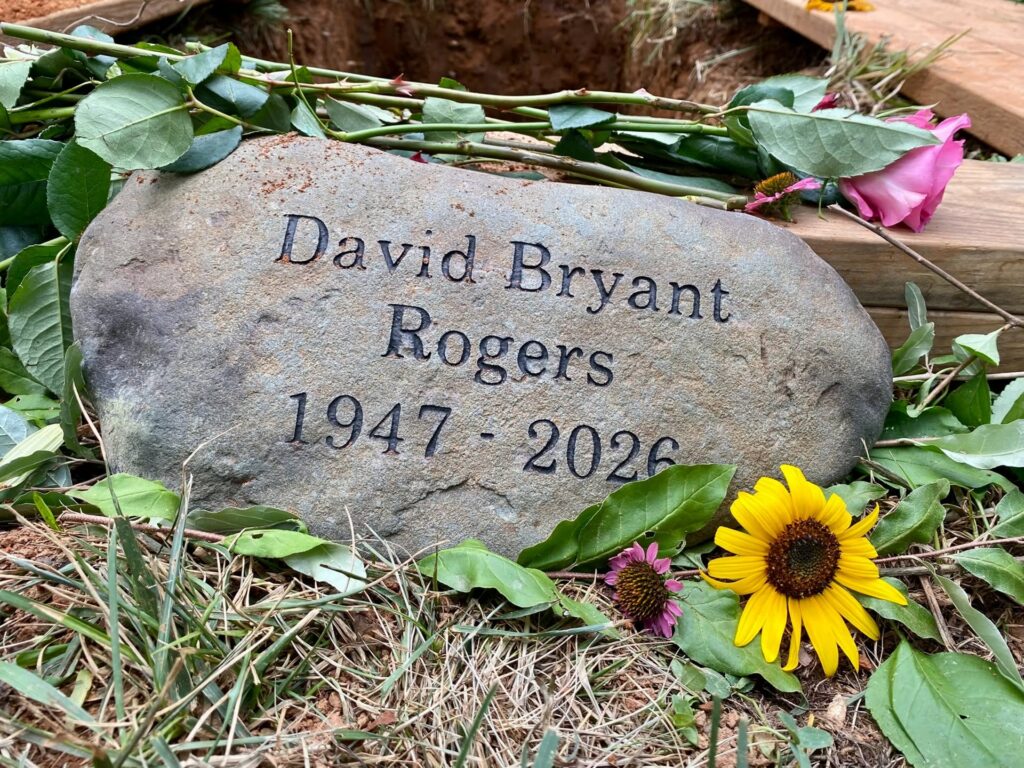 Rock with the name David Bryant Rogers and the years he was born and died etched onto it