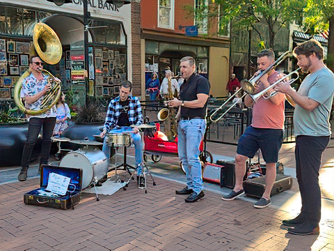 brass band busking on Charlottesville downtown mall